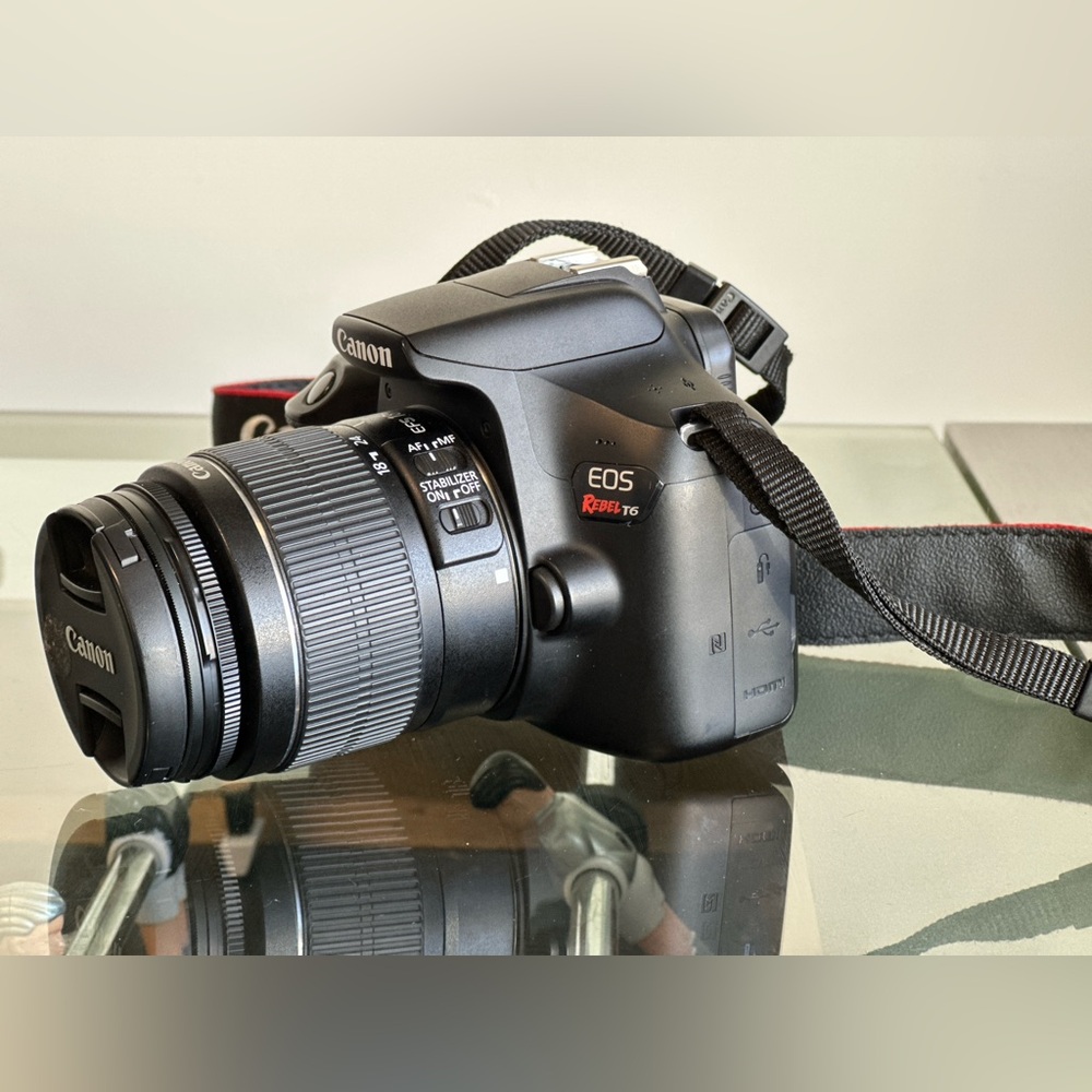 Canon Black Digital Camera with Interchangeable Lenses and LCD Screen